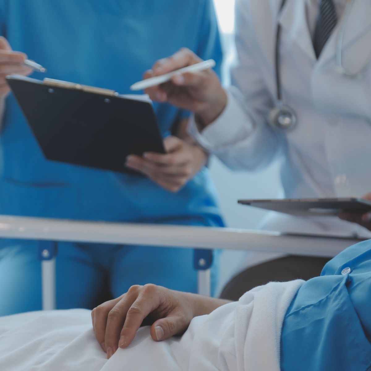 Doctors taking care of a wounded patient with allografts