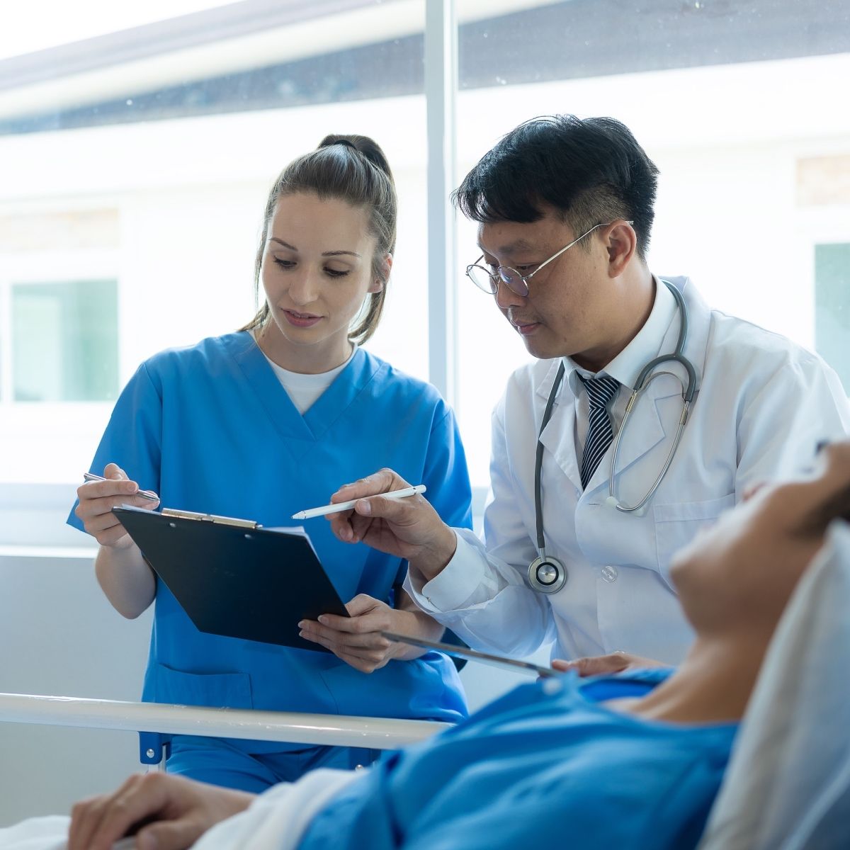 Doctors treating a burn patient